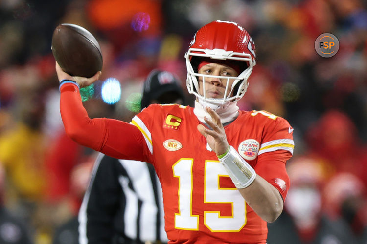 KANSAS CITY, MO - JANUARY 13: Kansas City Chiefs quarterback Patrick Mahomes (15) throws an 11-yard touchdown pass in the first quarter of an AFC Wild Card playoff game between the Miami Dolphins and Kansas City Chiefs on Jan 13, 2024 at GEHA Field at Arrowhead Stadium in Kansas City, MO. (Photo by Scott Winters/Icon Sportswire)