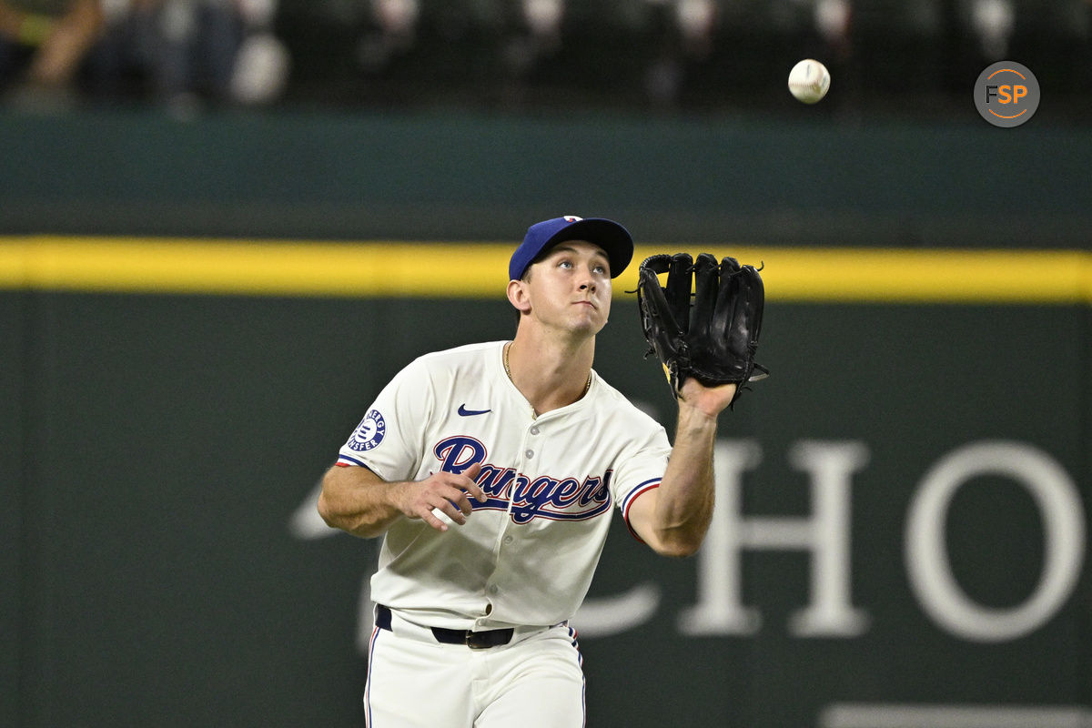 Sep 17, 2024; Arlington, Texas, USA; Texas Rangers left fielder Wyatt Langford (36) catches a fly ball during the game against the Toronto Blue Jays at Globe Life Field. Credit: Jerome Miron-Imagn Images