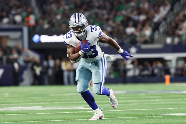 Nov 23, 2025; Arlington, Texas, USA; Dallas Cowboys running back Javonte Williams (33) runs with the ball in the second quarter against the Philadelphia Eagles at AT&T Stadium. Mandatory Credit: Kevin Jairaj-Imagn Images
