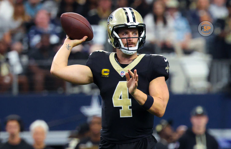 Sep 15, 2024; Arlington, Texas, USA;  New Orleans Saints quarterback Derek Carr (4) throws during the first half against the Dallas Cowboys at AT&T Stadium. Credit: Kevin Jairaj-Imagn Images