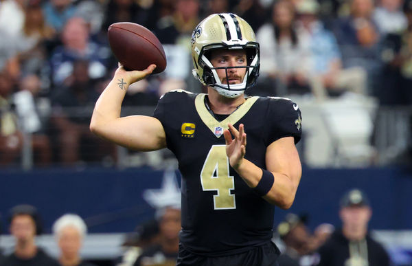 Sep 15, 2024; Arlington, Texas, USA;  New Orleans Saints quarterback Derek Carr (4) throws during the first half against the Dallas Cowboys at AT&T Stadium. Mandatory Credit: Kevin Jairaj-Imagn Images