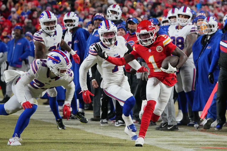 Jan 26, 2025; Kansas City, MO, USA; Kansas City Chiefs wide receiver Xavier Worthy (1) makes a catch against Buffalo Bills safety Cole Bishop (24) in the AFC Championship game at GEHA Field at Arrowhead Stadium. Credit: Denny Medley-Imagn Images