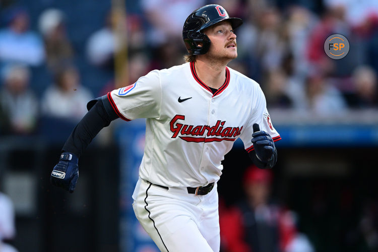 Apr 21, 2025; Cleveland, Ohio, USA; Cleveland Guardians designated hitter Kyle Manzardo (9) watches the ball after hitting a solo home run off New York Yankees starting pitcher Clarke Schmidt (36) during the third inning at Progressive Field. Credit: David Dermer-Imagn Images