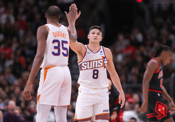 CHICAGO, IL - NOVEMBER 08: Grayson Allen #8 of the Phoenix Suns high fives Kevin Durant #35 of the Phoenix Suns after making a 3-point basket during the second half against the Chicago Bulls at the United Center on November 8, 2023 in Chicago, Illinois. (Photo by Melissa Tamez/Icon Sportswire)