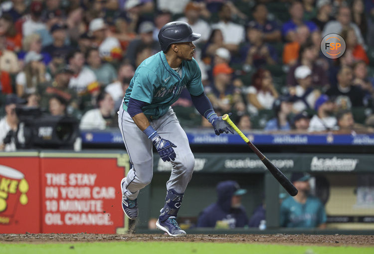 Sep 23, 2024; Houston, Texas, USA; Seattle Mariners second baseman Jorge Polanco (7) hits an RBI double during the eighth inning against the Houston Astros at Minute Maid Park. Credit: Troy Taormina-Imagn Images