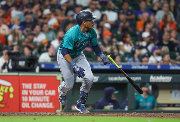 Sep 23, 2024; Houston, Texas, USA; Seattle Mariners second baseman Jorge Polanco (7) hits an RBI double during the eighth inning against the Houston Astros at Minute Maid Park. Mandatory Credit: Troy Taormina-Imagn Images