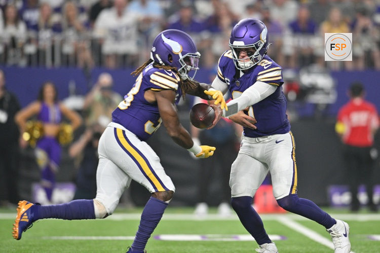 Sep 14, 2025; Minneapolis, Minnesota, USA; Minnesota Vikings quarterback J.J. McCarthy (9) hands off the ball to Minnesota Vikings running back Aaron Jones Sr. (33) during the first half at U.S. Bank Stadium. Credit: Jeffrey Becker-Imagn Images