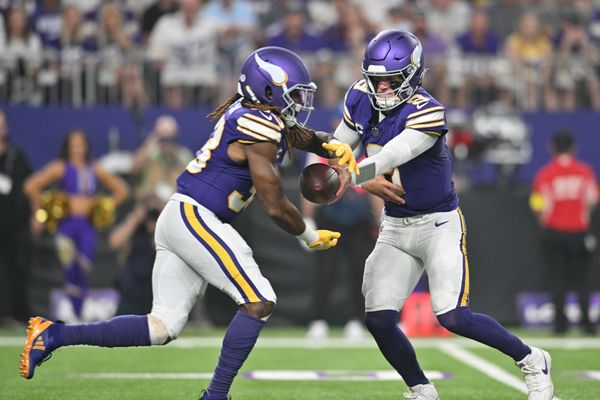 Sep 14, 2025; Minneapolis, Minnesota, USA; Minnesota Vikings quarterback J.J. McCarthy (9) hands off the ball to Minnesota Vikings running back Aaron Jones Sr. (33) during the first half at U.S. Bank Stadium. Mandatory Credit: Jeffrey Becker-Imagn Images