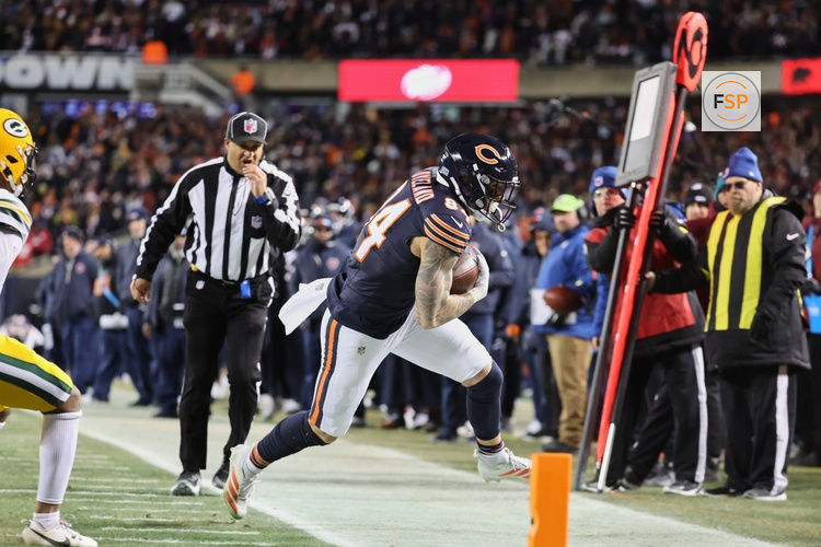 Dec 20, 2025; Chicago, Illinois, USA; Chicago Bears tight end Colston Loveland (84) runs out of bounds after the catch against the Green Bay Packers during overtime at Soldier Field. Credit: Mike Dinovo-Imagn Images