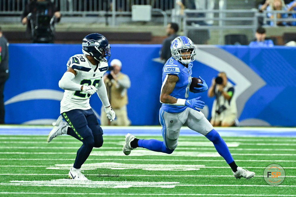 DETROIT, MI - SEPTEMBER 17: Detroit Lions wide receiver Josh Reynolds (8) runs wide away from Seattle Seahawks safety Julian Love (20) during the Detroit Lions versus the Seattle Seahawks game on Sunday September 17, 2023 at Ford Field in Detroit, MI. (Photo by Steven King/Icon Sportswire)