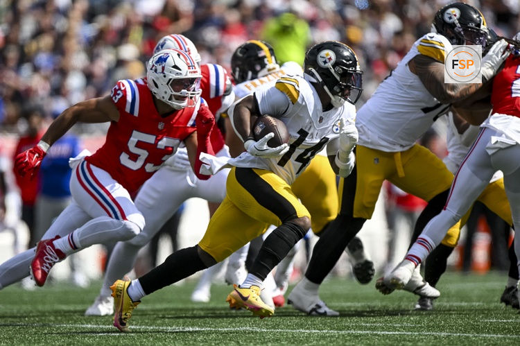 Sep 21, 2025; Foxborough, Massachusetts, USA; Pittsburgh Steelers running back Kenneth Gainwell (14) runs the ball during the first quarter at Gillette Stadium. Credit: Paul Rutherford-Imagn Images