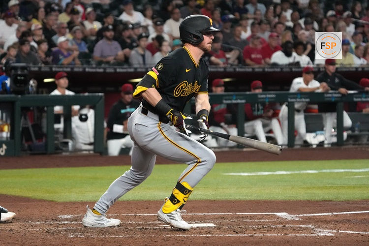 May 7, 2026; Phoenix, Arizona, USA; Pittsburgh Pirates right fielder Ryan O'Hearn (29) hits an RBI single against the Arizona Diamondbacks in the fifth inning at Chase Field. Credit: Rick Scuteri-Imagn Images