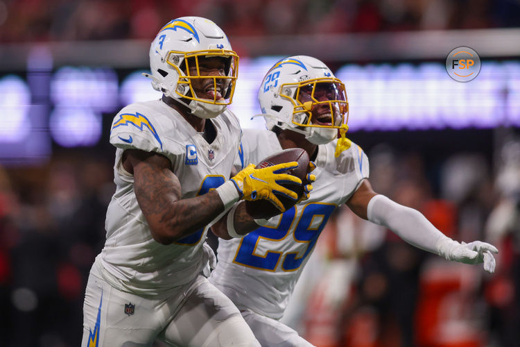 Dec 1, 2024; Atlanta, Georgia, USA; Los Angeles Chargers safety Derwin James Jr. (3) celebrates after an interception with cornerback Tarheeb Still (29) against the Atlanta Falcons in the fourth quarter at Mercedes-Benz Stadium. Credit: Brett Davis-Imagn Images