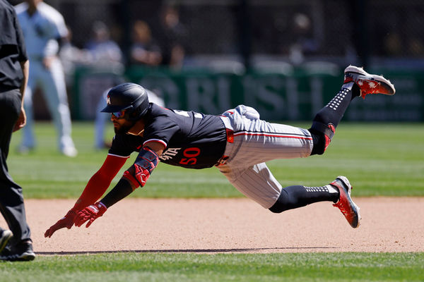 CHICAGO, IL - MAY 01: Minnesota Twins outfielder Willi Castro (50) slides safely at second base with a double in the ninth inning of an MLB game against the Chicago White Sox on May 01, 2024 at Guaranteed Rate Field in Chicago, Illinois. (Photo by Joe Robbins/Icon Sportswire)