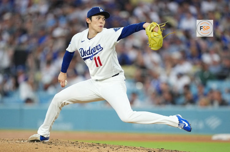 Jun 19, 2026; Los Angeles, California, USA; Los Angeles Dodgers pitcher Roki Sasaki (11) throws during the first inning against the Baltimore Orioles at Dodger Stadium. Credit: Kirby Lee-Imagn Images