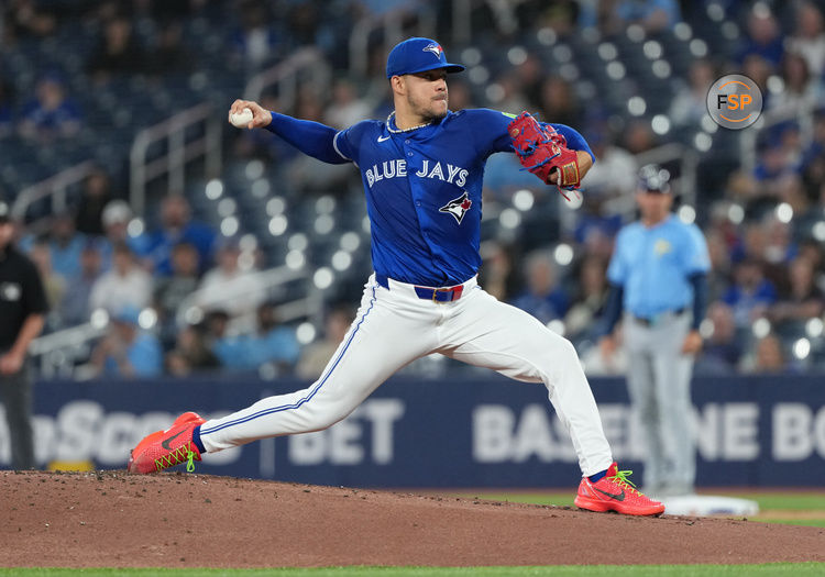 May 13, 2025; Toronto, Ontario, CAN; Toronto Blue Jays starting pitcher Jose Berrios (17) throws a pitch against the Tampa Bay Rays during the first inning at Rogers Centre. Credit: Nick Turchiaro-Imagn Images