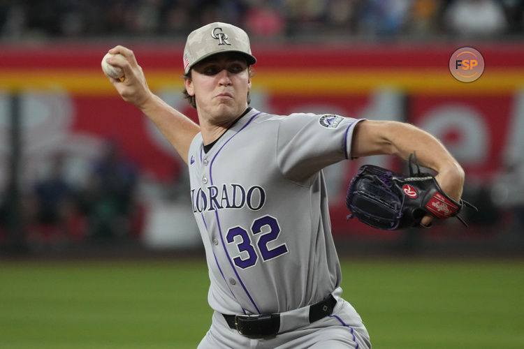 May 18, 2025; Phoenix, Arizona, USA; Colorado Rockies pitcher Chase Dollander (32) throws against the Arizona Diamondbacks in the first inning at Chase Field. Credit: Rick Scuteri-Imagn Images