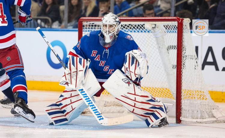 Apr 5, 2026; New York, New York, USA; New York Rangers goalie Igor Shesterkin (31) guards the net against the Washington Capitals during the first period at Madison Square Garden. Credit: Danny Wild-Imagn Images