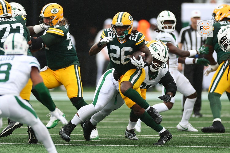 Sep 20, 2026; East Rutherford, New Jersey, USA;  Green Bay Packers running back Kaleb Johnson (26) carries the ball during the first quarter against the New York Jets at MetLife Stadium.  Credit: Vincent Carchietta-Imagn Images