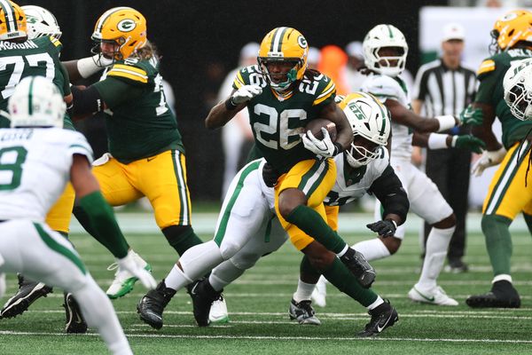Sep 20, 2026; East Rutherford, New Jersey, USA;  Green Bay Packers running back Kaleb Johnson (26) carries the ball during the first quarter against the New York Jets at MetLife Stadium.  Mandatory Credit: Vincent Carchietta-Imagn Images