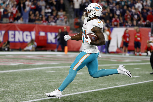 FOXBOROUGH, MA - SEPTEMBER 17: Miami Dolphins running back Raheem Mostert (31) strides to the end zone during a game between the New England Patriots and the Miami Dolphins on September 17, 2023, at Gillette Stadium in Foxborough, Massachusetts. (Photo by Fred Kfoury III/Icon Sportswire)