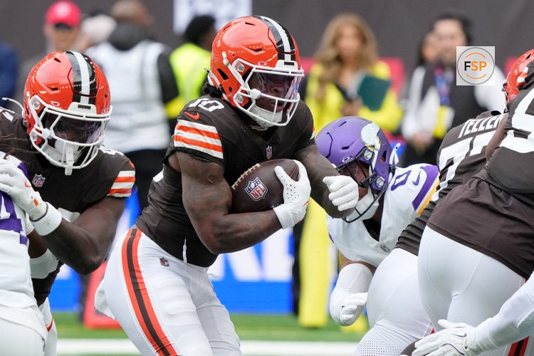 Oct 5, 2025; Tottenham, United Kingdom; Cleveland Browns running back Quinshon Judkins (10) runs with the ball against the Minnesota Vikings during the first quarter of an NFL International Series game at Tottenham Hotspur Stadium. Credit: Kirby Lee-Imagn Images
