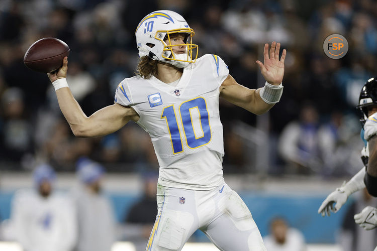 JACKSONVILLE, FL - JANUARY 14: Los Angeles Chargers quarterback Justin Herbert (10) throws a pass during the game between the Los Angeles Chargers and the Jacksonville Jaguars on January 14, 2023 at TIAA Bank Field in Jacksonville, Fl. (Photo by David Rosenblum/Icon Sportswire)