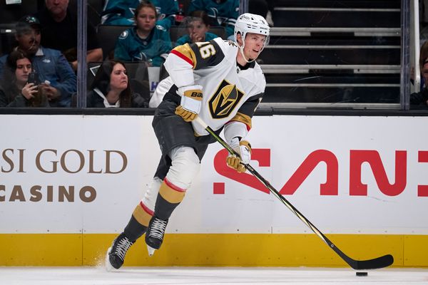 Oct 9, 2025; San Jose, California, USA; Vegas Golden Knights right wing Pavel Dorofeyev (16) plays the puck along the boards against the San Jose Sharks during the first period at SAP Center at San Jose. Mandatory Credit: Robert Edwards-Imagn Images