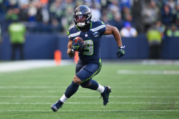 Jan 25, 2026; Seattle, WA, USA; Seattle Seahawks running back Kenneth Walker III (9) runs against the Los Angeles Rams in the first half in the 2026 NFC Championship Game at Lumen Field. Mandatory Credit: Steven Bisig-Imagn Images