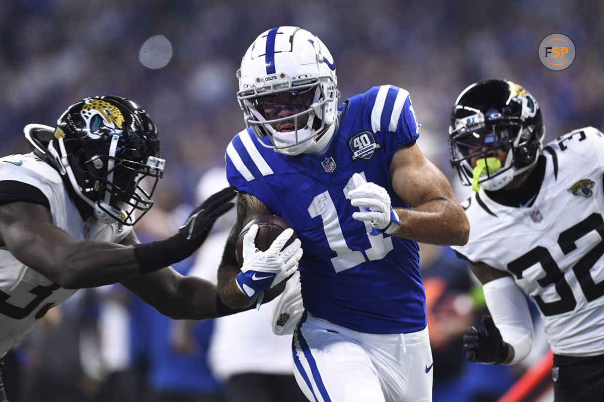 INDIANAPOLIS, IN - SEPTEMBER 10: Indianapolis Colts Wide Receiver Michael Pittman (11) carries the ball for a touchdown during the NFL game between the Jacksonville Jaguars and the Indianapolis Colts on September 10, 2023, at Lucas Oil Stadium in Indianapolis, Indiana. (Photo by Michael Allio/Icon Sportswire)