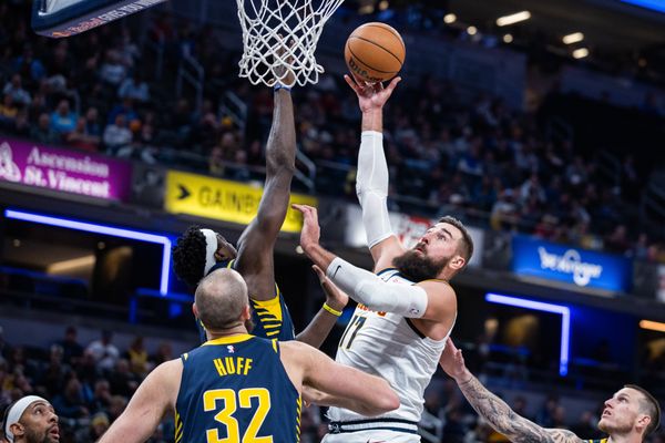 Dec 3, 2025; Indianapolis, Indiana, USA; Denver Nuggets center Jonas Valanciunas (17) shoots the ball while Indiana Pacers forward Pascal Siakam (43)  defends in the first  half at Gainbridge Fieldhouse. Mandatory Credit: Trevor Ruszkowski-Imagn Images