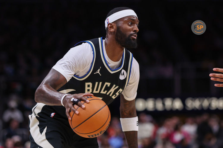 Feb 7, 2025; Atlanta, Georgia, USA; Milwaukee Bucks forward Bobby Portis (9) dribbles against the Atlanta Hawks in the first quarter at State Farm Arena. Credit: Brett Davis-Imagn Images