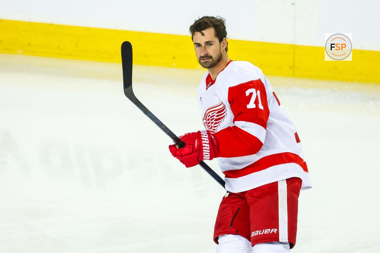 Oct 24, 2026; Calgary, Alberta, CAN; Detroit Red Wings center Dylan Larkin (71) skates during the warmup period against the Calgary Flames at Scotiabank Saddledome. Credit: Sergei Belski-Imagn Images