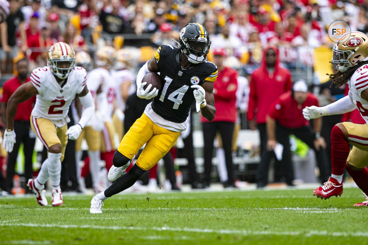 PITTSBURGH, PA - SEPTEMBER 10: Pittsburgh Steelers wide receiver George Pickens (14) runs with the ball after making a catch during the regular season NFL football game between the San Francisco 49ers and the Pittsburgh Steelers on September 10, 2023 at Acrisure Stadium in Pittsburgh, PA. (Photo by Mark Alberti/Icon Sportswire)