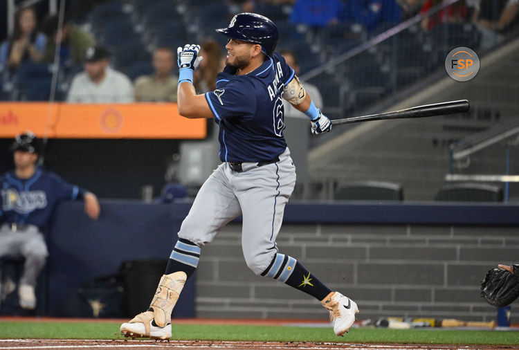 May 14, 2025; Toronto, Ontario, CAN;  Tampa Bay Rays first baseman Jonathan Aranda (62) hits a single against the Toronto Blue Jays in the first inning at Rogers Centre. Credit: Dan Hamilton-Imagn Images