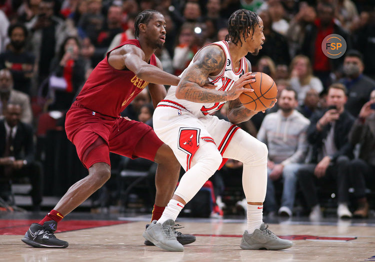 CHICAGO, IL - DECEMBER 31: Cleveland Cavaliers Guard Caris LeVert (3) guards Chicago Bulls Forward DeMar DeRozan (11) during a NBA game between the Cleveland  Cavaliers and the Chicago Bulls on December 31, 2022 at the United Center in Chicago, IL. (Photo by Melissa Tamez/Icon Sportswire)