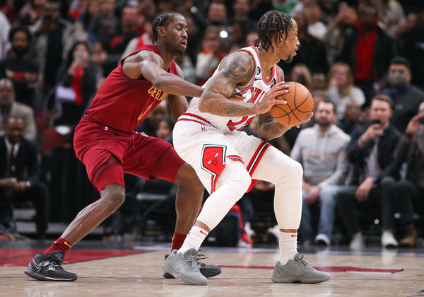 CHICAGO, IL - DECEMBER 31: Cleveland Cavaliers Guard Caris LeVert (3) guards Chicago Bulls Forward DeMar DeRozan (11) during a NBA game between the Cleveland  Cavaliers and the Chicago Bulls on December 31, 2022 at the United Center in Chicago, IL. (Photo by Melissa Tamez/Icon Sportswire)