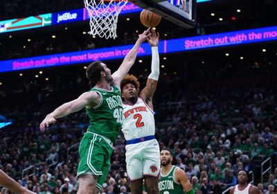 Oct 22, 2024; Boston, Massachusetts, USA; New York Knicks guard Miles McBride (2) shoots against Boston Celtics center Luke Kornet (40) in the second half at TD Garden. Mandatory Credit: David Butler II-Imagn Images