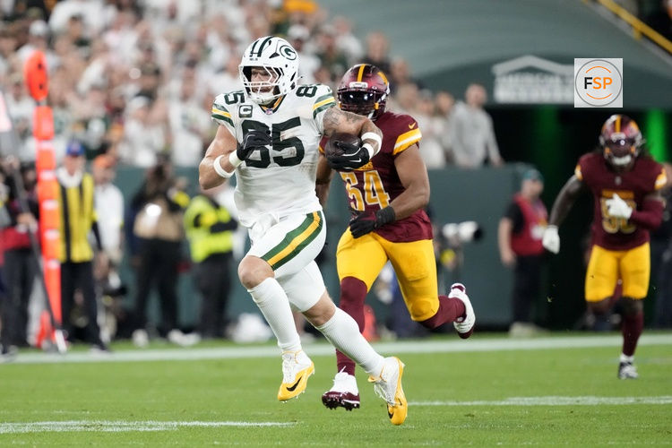 Sep 11, 2025; Green Bay, Wisconsin, USA; Green Bay Packers tight end Tucker Kraft (85) runs against the Washington Commanders in the first quarter at Lambeau Field. Credit: Jeff Hanisch-Imagn Images