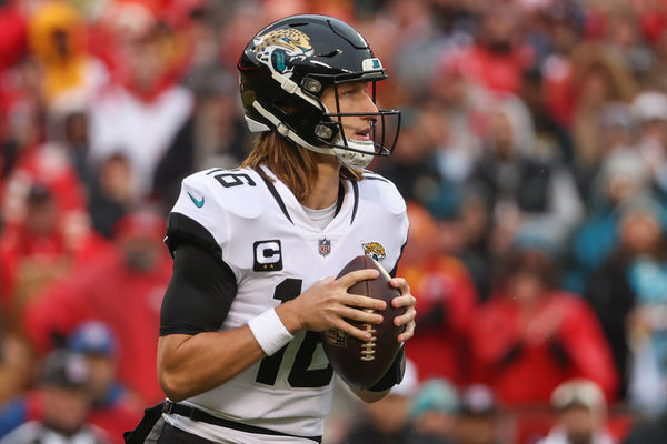 KANSAS CITY, MO - JANUARY 21: Jacksonville Jaguars quarterback Trevor Lawrence (16) looks to pass in the first quarter of an AFC divisional playoff game between the Jacksonville Jaguars and Kansas City Chiefs on January 21, 2023 at GEHA Field at Arrowhead Stadium in Kansas City, MO. (Photo by Scott Winters/Icon Sportswire)