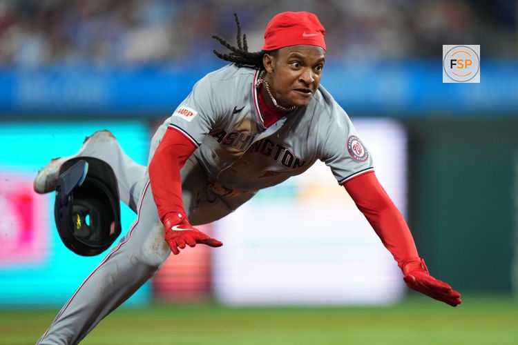 Mar 31, 2026; Philadelphia, Pennsylvania, USA; Washington Nationals infielder CJ Abrams (5) slides into third against the Philadelphia Phillies in the sixth inning at Citizens Bank Park. Credit: Kyle Ross-Imagn Images