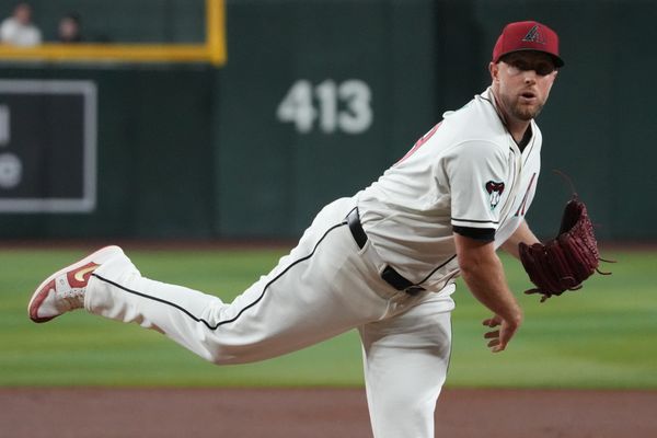 Jul 22, 2026; Phoenix, Arizona, USA; Arizona Diamondbacks pitcher Merrill Kelly (29) throws a pitch against the Athletics in the first inning at Chase Field. Mandatory Credit: Rick Scuteri-Imagn Images