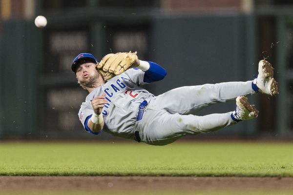 Jun 12, 2026; San Francisco, California, USA; Chicago Cubs second baseman Nico Hoerner (2) throws to first base against the San Francisco Giants after committing an error during the sixth inning at Oracle Park. Mandatory Credit: John Hefti-Imagn Images