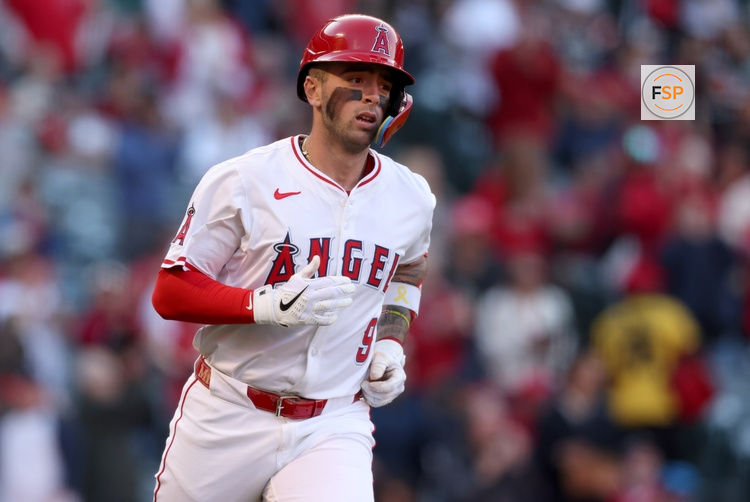 May 2, 2025; Anaheim, California, USA; Los Angeles Angels shortstop Zach Neto (9) reacts after hitting a home rub during the 1st inning against the Detroit Tigers at Angel Stadium. Credit: Jason Parkhurst-Imagn Images