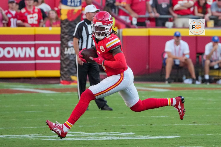 Sep 15, 2024; Kansas City, Missouri, USA; Kansas City Chiefs wide receiver Rashee Rice (4) catches a pass against the Cincinnati Bengals during the game at GEHA Field at Arrowhead Stadium. Credit: Denny Medley-Imagn Images