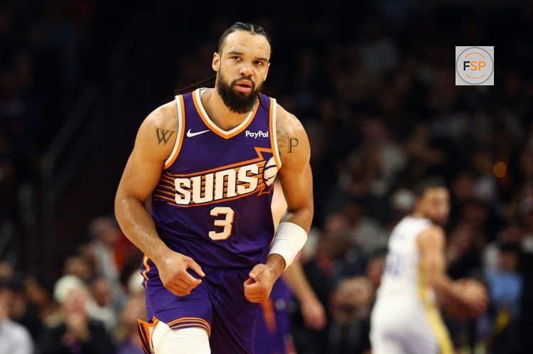 Dec 18, 2025; Phoenix, Arizona, USA; Phoenix Suns forward Dillon Brooks (3) against the Golden State Warriors in the first half at Mortgage Matchup Center. Credit: Mark J. Rebilas-Imagn Images