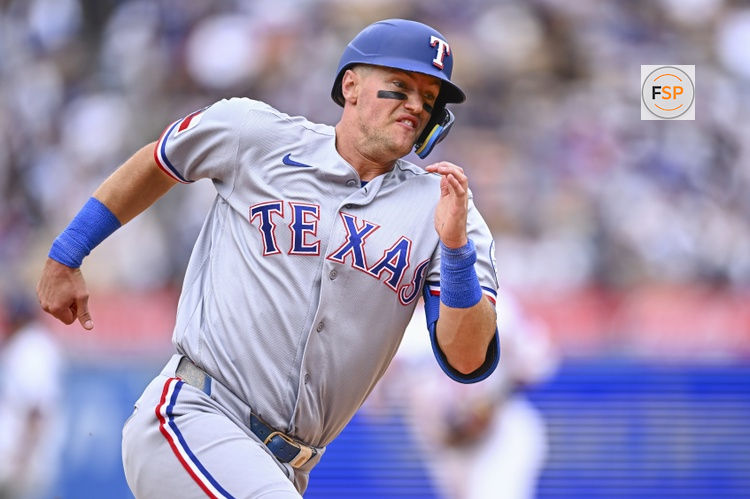 Apr 12, 2026; Los Angeles, California, USA; Texas Rangers third baseman Josh Jung (6) runs to home plate to score a run against the Los Angeles Dodgers during the eighth inning at Dodger Stadium. Credit: Jonathan Hui-Imagn Images