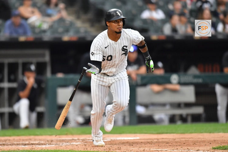 Jul 30, 2025; Chicago, Illinois, USA; Chicago White Sox second baseman Lenyn Sosa (50) hits a RBI single during the seventh inning against the Philadelphia Phillies at Rate Field. Credit: Patrick Gorski-Imagn Images
