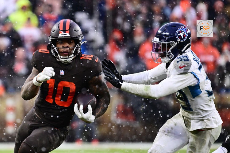 Dec 7, 2025; Cleveland, Ohio, USA; Cleveland Browns running back Quinshon Judkins (10) runs with the ball as Tennessee Titans cornerback Darrell Baker Jr. (39) defends during the third quarter at Huntington Bank Field. Credit: Ken Blaze-Imagn Images