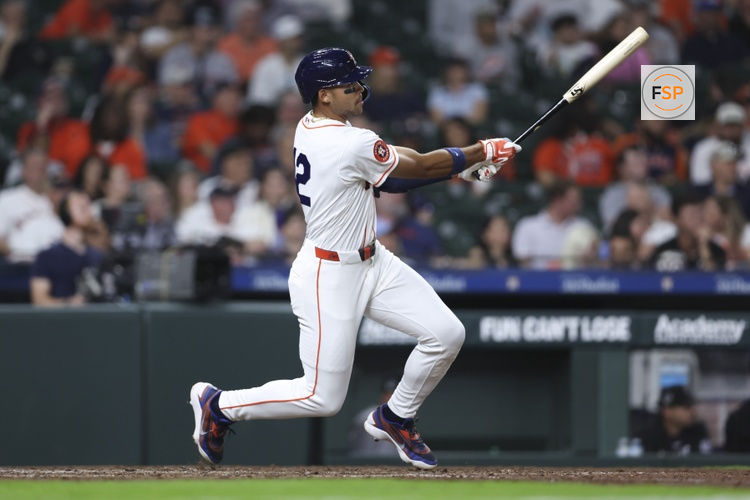Apr 15, 2026; Houston, Texas, USA; Houston Astros right fielder Cam Smith hits a double during the fifth inning against the Colorado Rockies at Daikin Park. Credit: Troy Taormina-Imagn Images